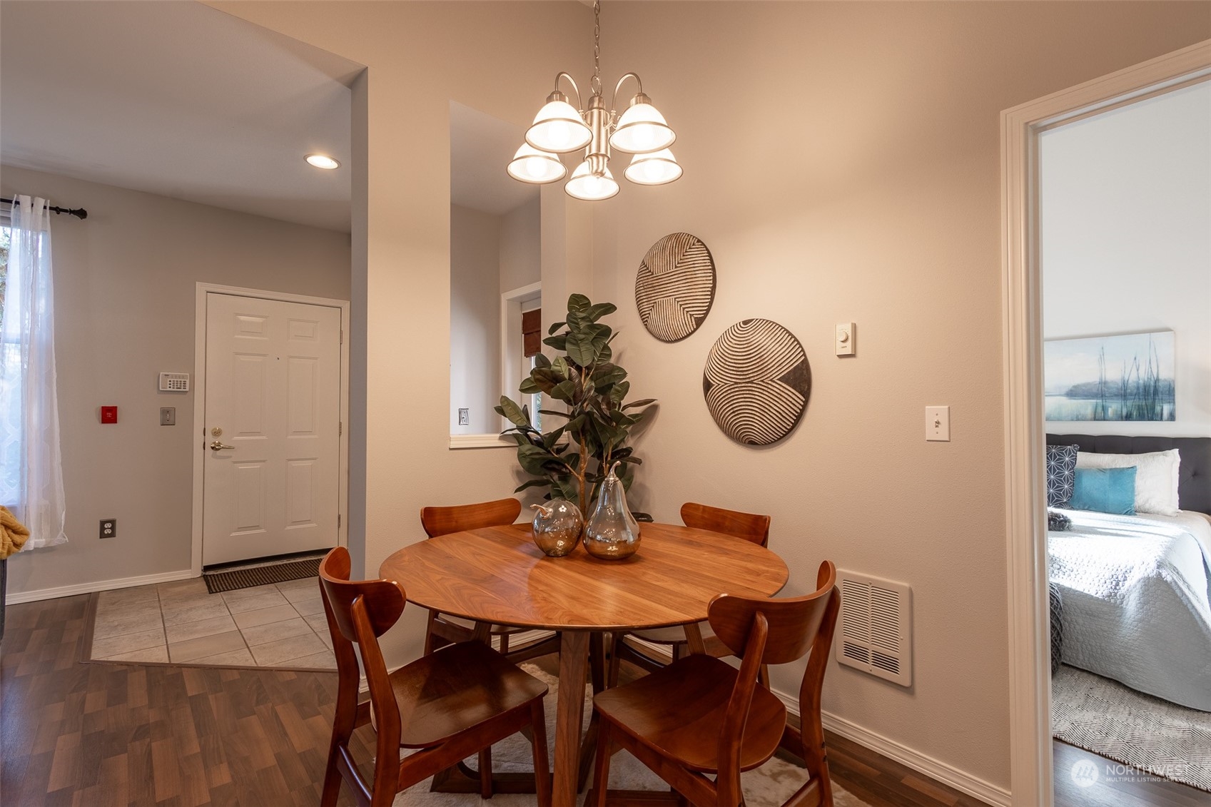 16125 Juanita Woodinville Way Northeast, Unit 2201 Bothell, WA 98011 - Photo 21 of 35 a view of a dining room with a table and chairs