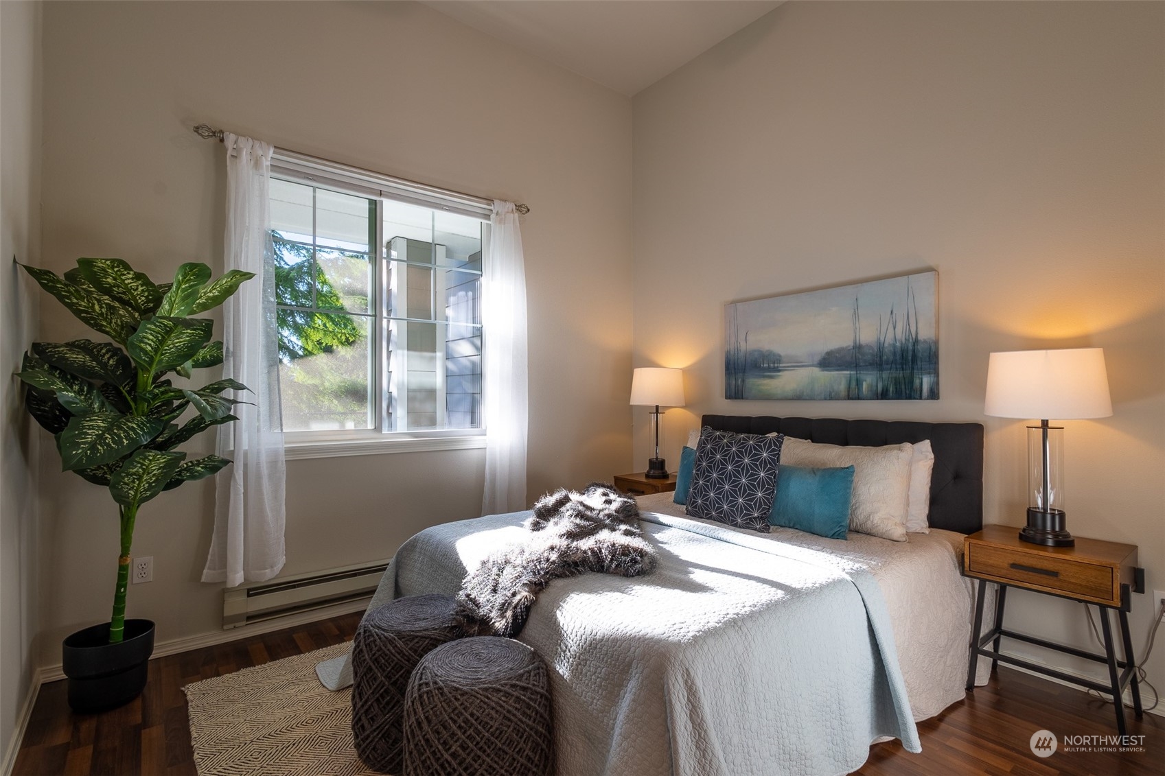 16125 Juanita Woodinville Way Northeast, Unit 2201 Bothell, WA 98011 - Photo 23 of 35 a bedroom with a bed and a window