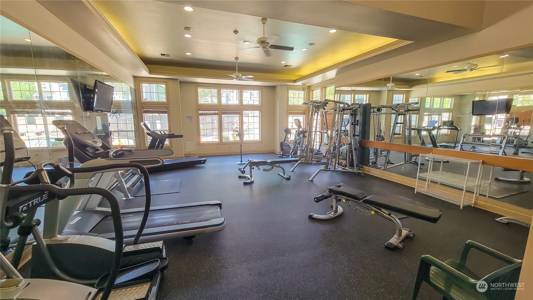 16125 Juanita Woodinville Way Northeast, Unit 2201 Bothell, WA 98011 - Photo 34 of 35 a room with gym equipment and a large window