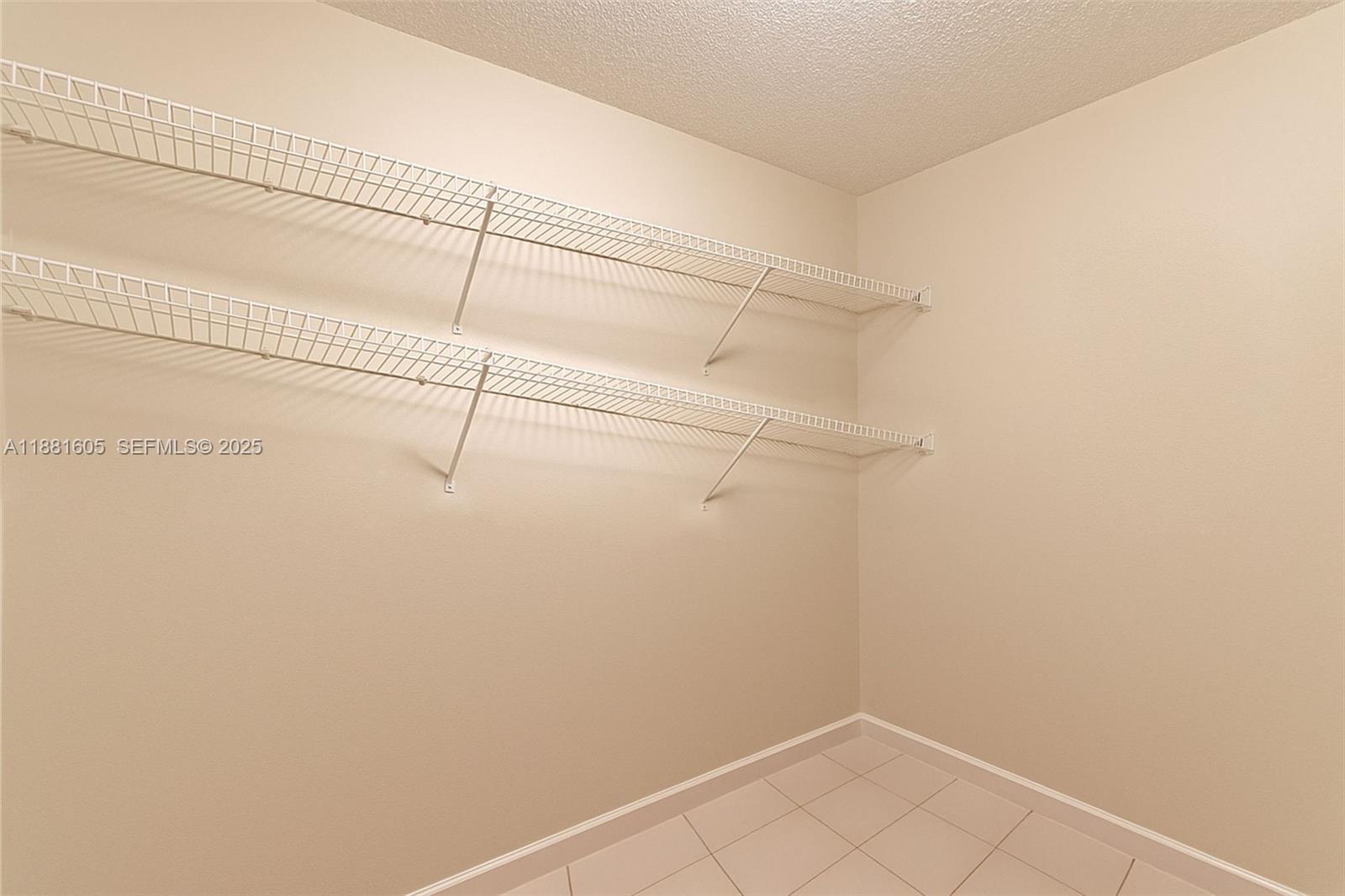 407 Northwest 18th Street Homestead, FL 33030 - Photo 25 of 44 LARGE PRIMARY BEDROOM WALK IN CLOSET