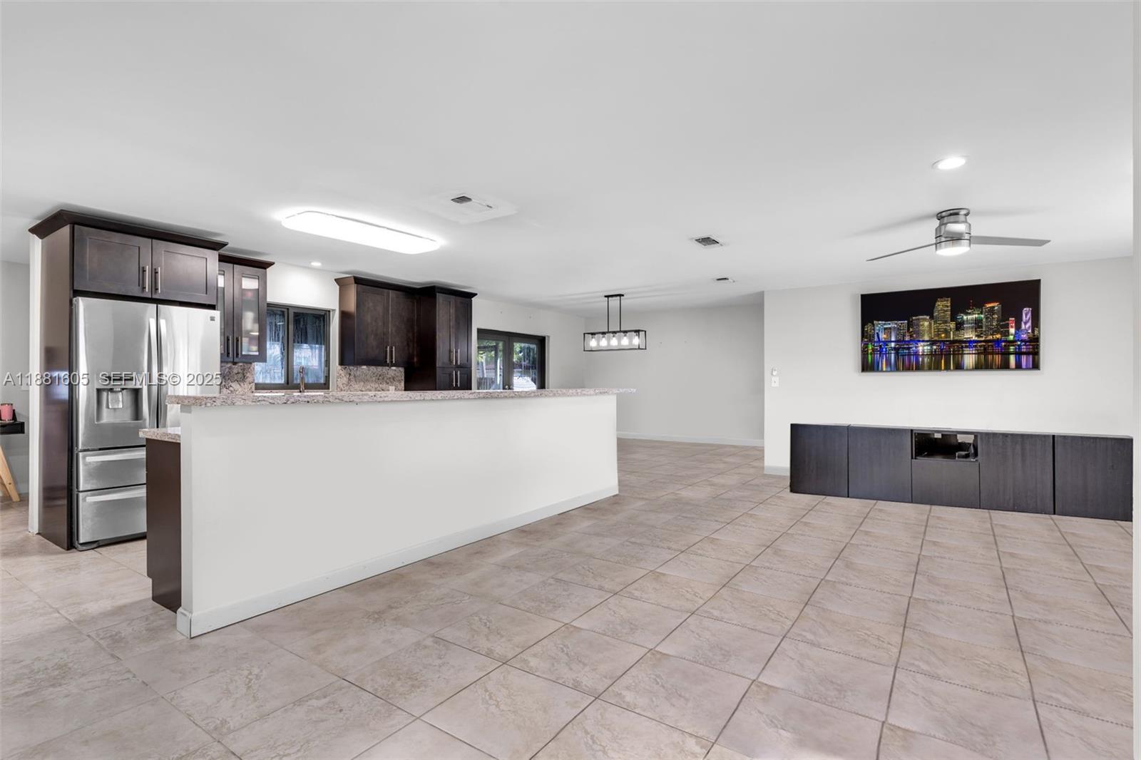 407 Northwest 18th Street Homestead, FL 33030 - Photo 3 of 44 OPEN CONCEPT GREAT ROOMUPDATEDKITCHEN