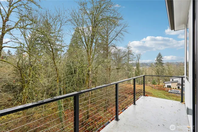 a view of mountain with wooden floor
