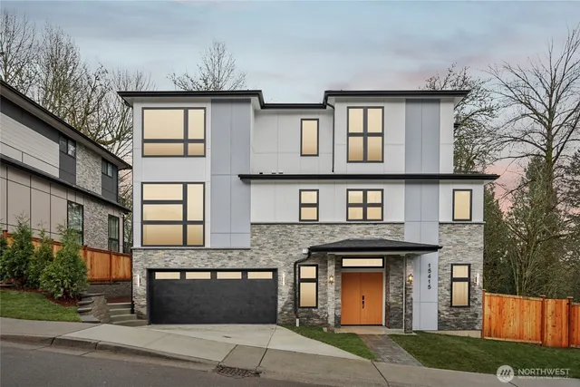 a front view of a house with yard