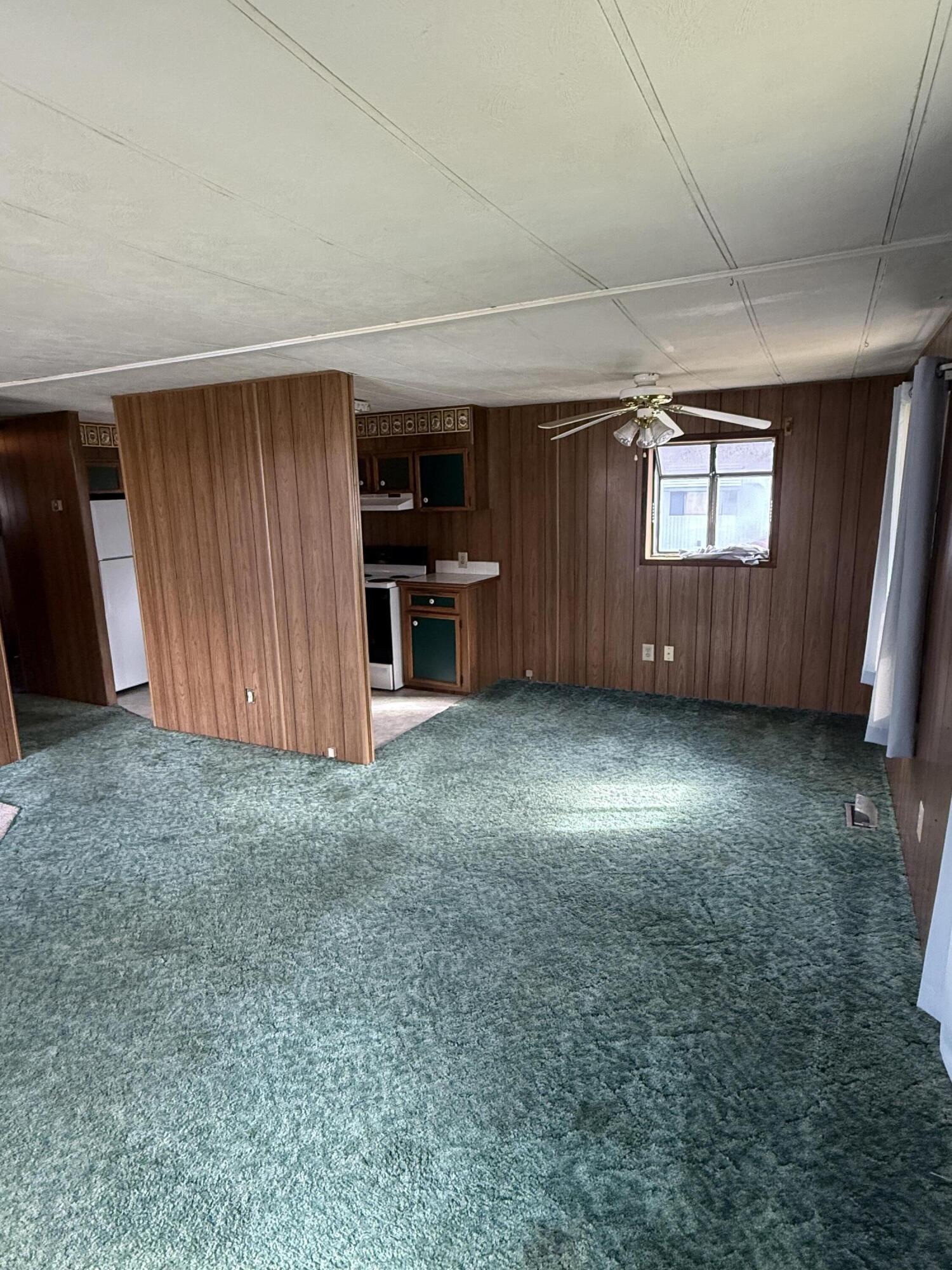 421 Stevens Road, Unit 20 Eagle Point, OR 97524 - Photo 6 of 22 an empty room with windows