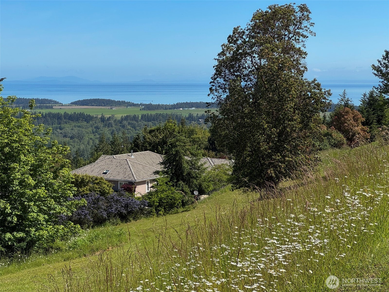 -nka Owls Nest Road Sequim, WA 98382 - Photo 8 of 38 a view of a lake with a yard