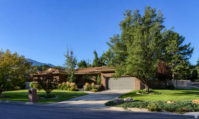 Brick exterior with attached garage