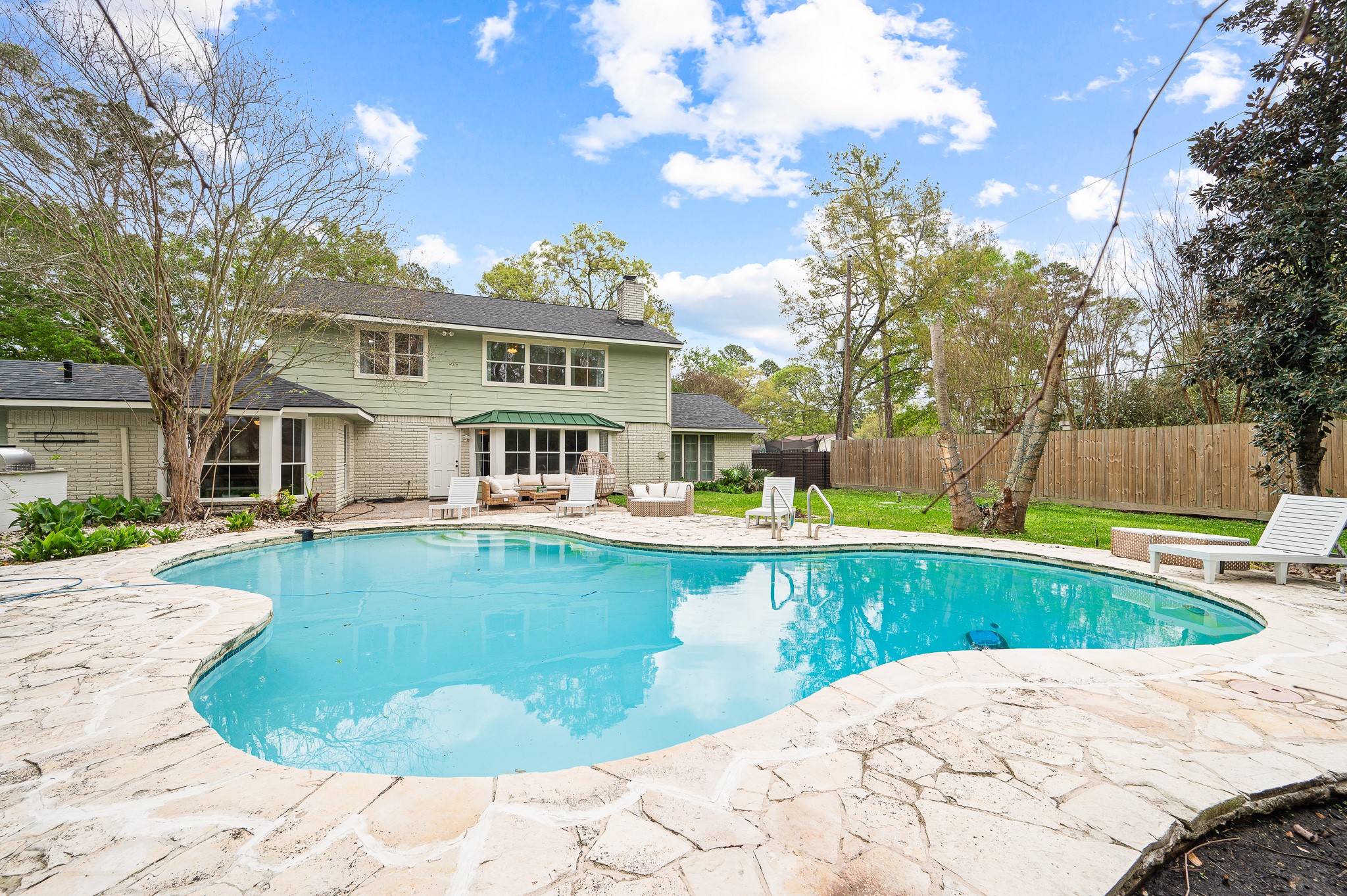 16811 Waycreek Road Houston, TX 77068 - Photo 14 of 50 Dive into summer fun with your in-ground pool, ready for sunny days and family gatherings!