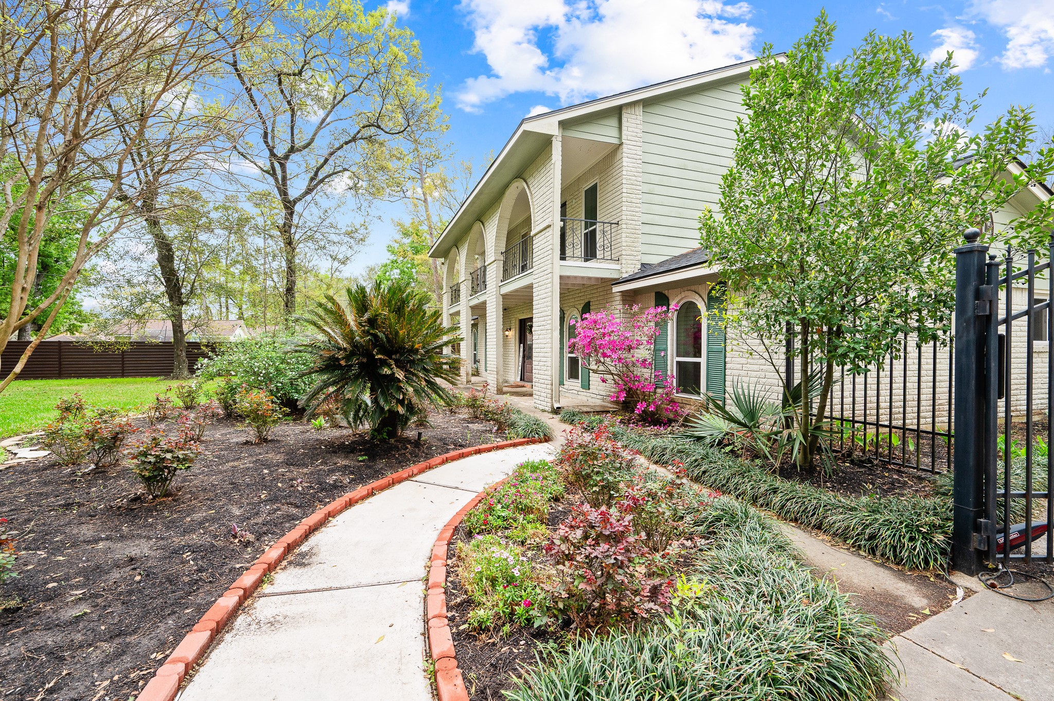 16811 Waycreek Road Houston, TX 77068 - Photo 3 of 50 Welcome to Waycreek Estate, where stunning curb appeal and a welcoming front yard set the tone for this exceptional home. Designed for both comfortable family living and effortless entertaining, this property provides the perfect setting to create lasting memories with family and friends.