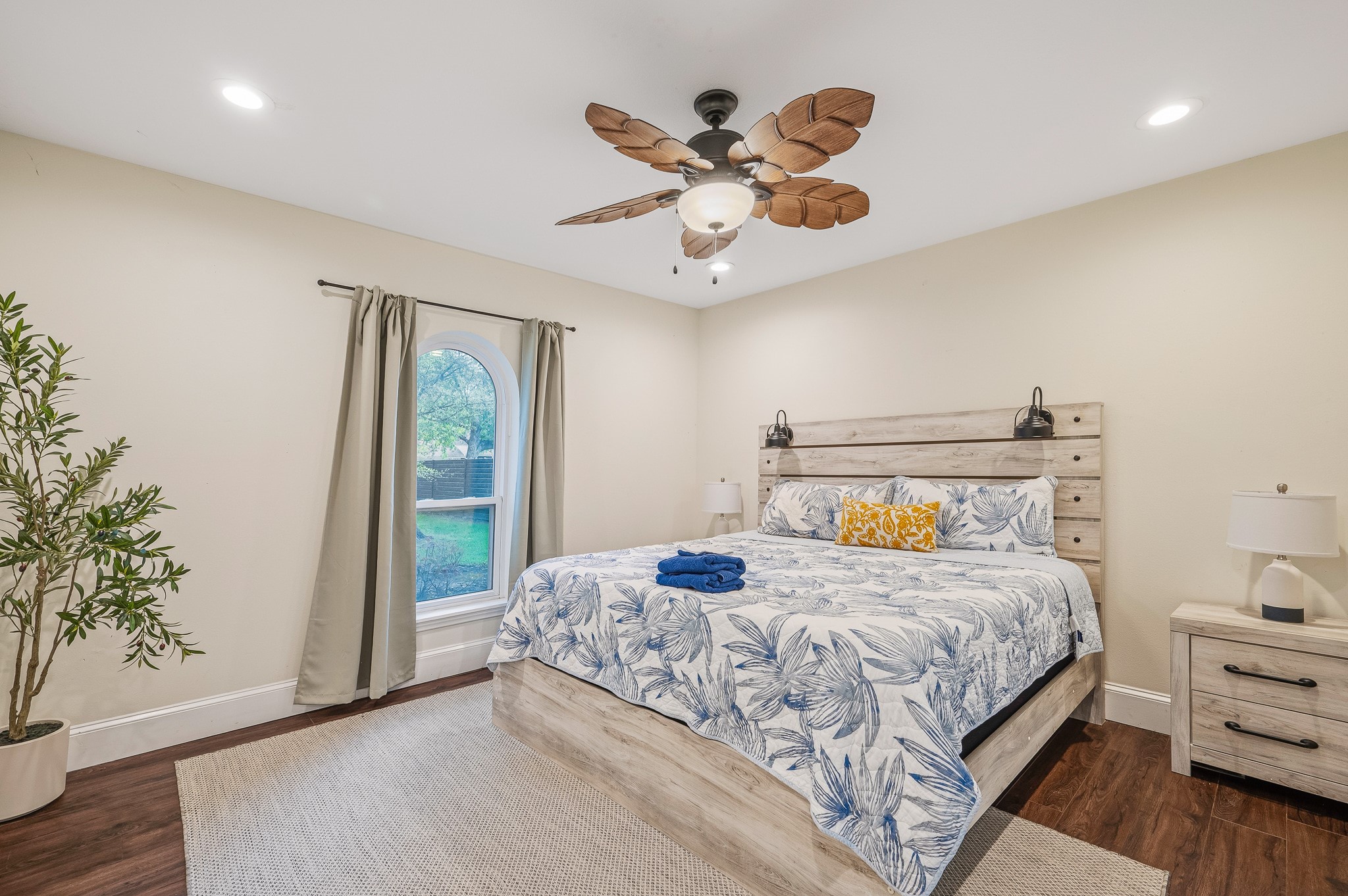 16811 Waycreek Road Houston, TX 77068 - Photo 35 of 50 a bedroom with a bed and wooden floor