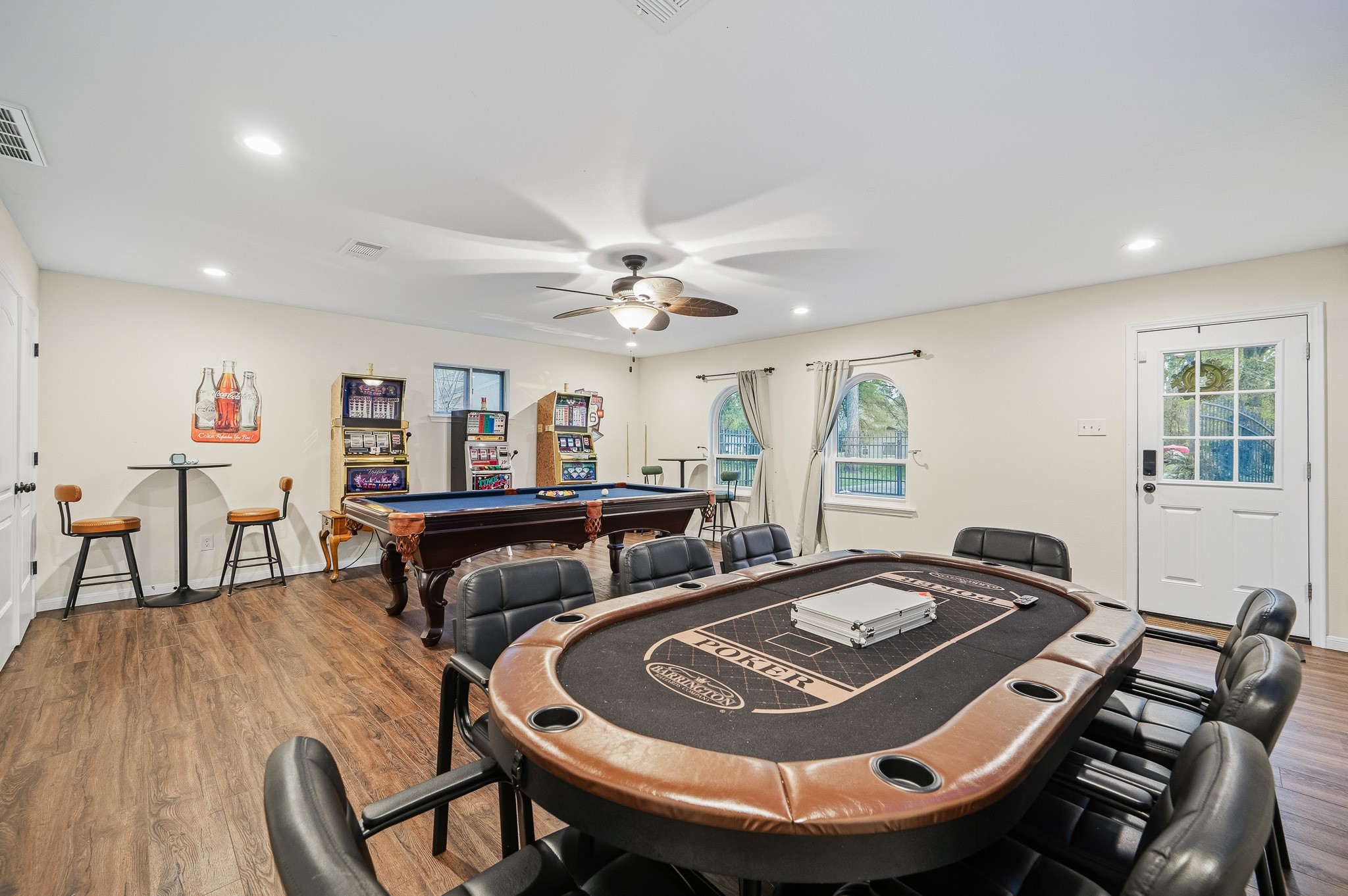 16811 Waycreek Road Houston, TX 77068 - Photo 47 of 50 a living room with furniture and a wooden floor