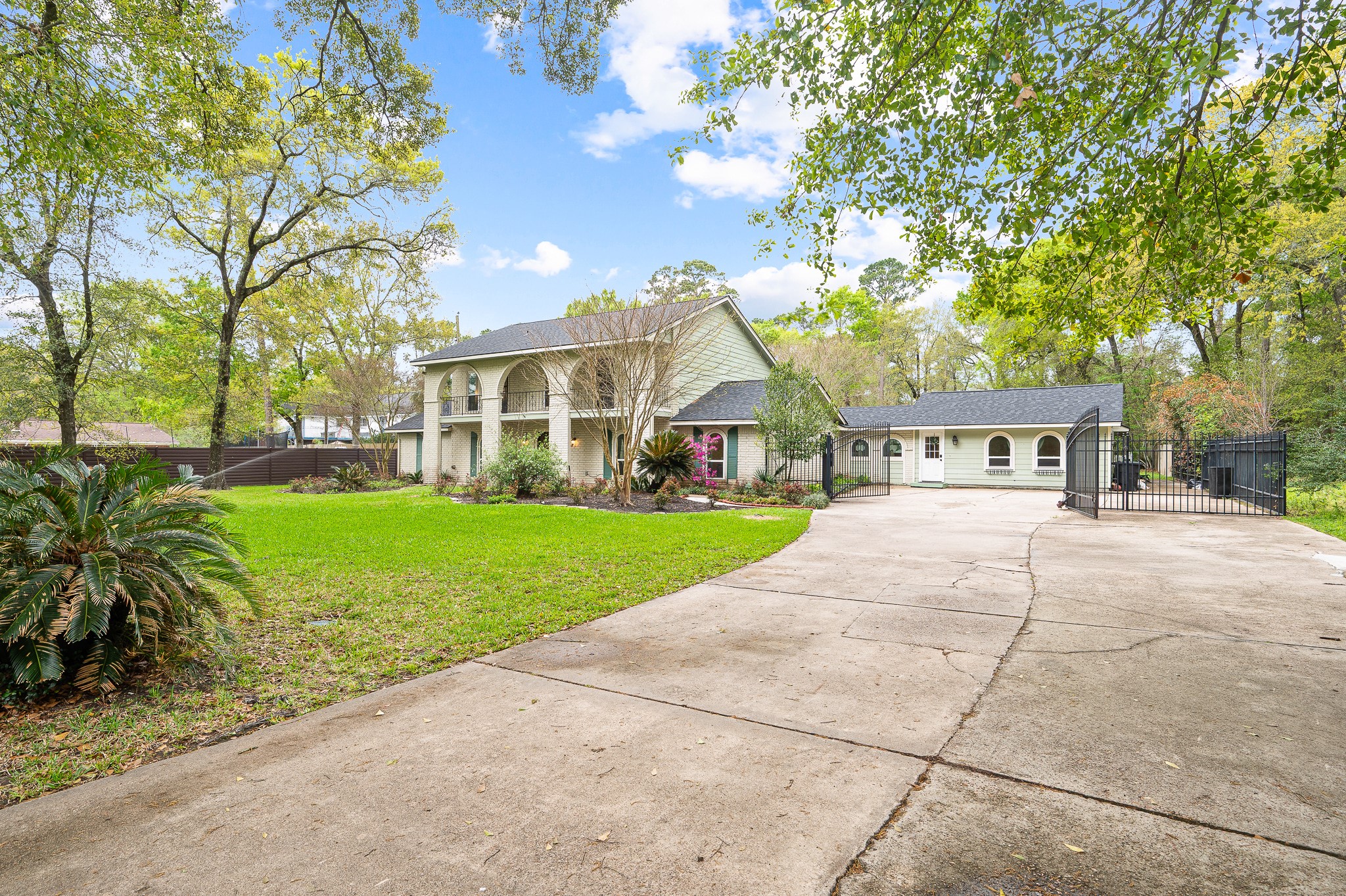 16811 Waycreek Road Houston, TX 77068 - Photo 9 of 50 The extra-long driveway provides parking for more than 10 vehicles, perfect for guests and gatherings