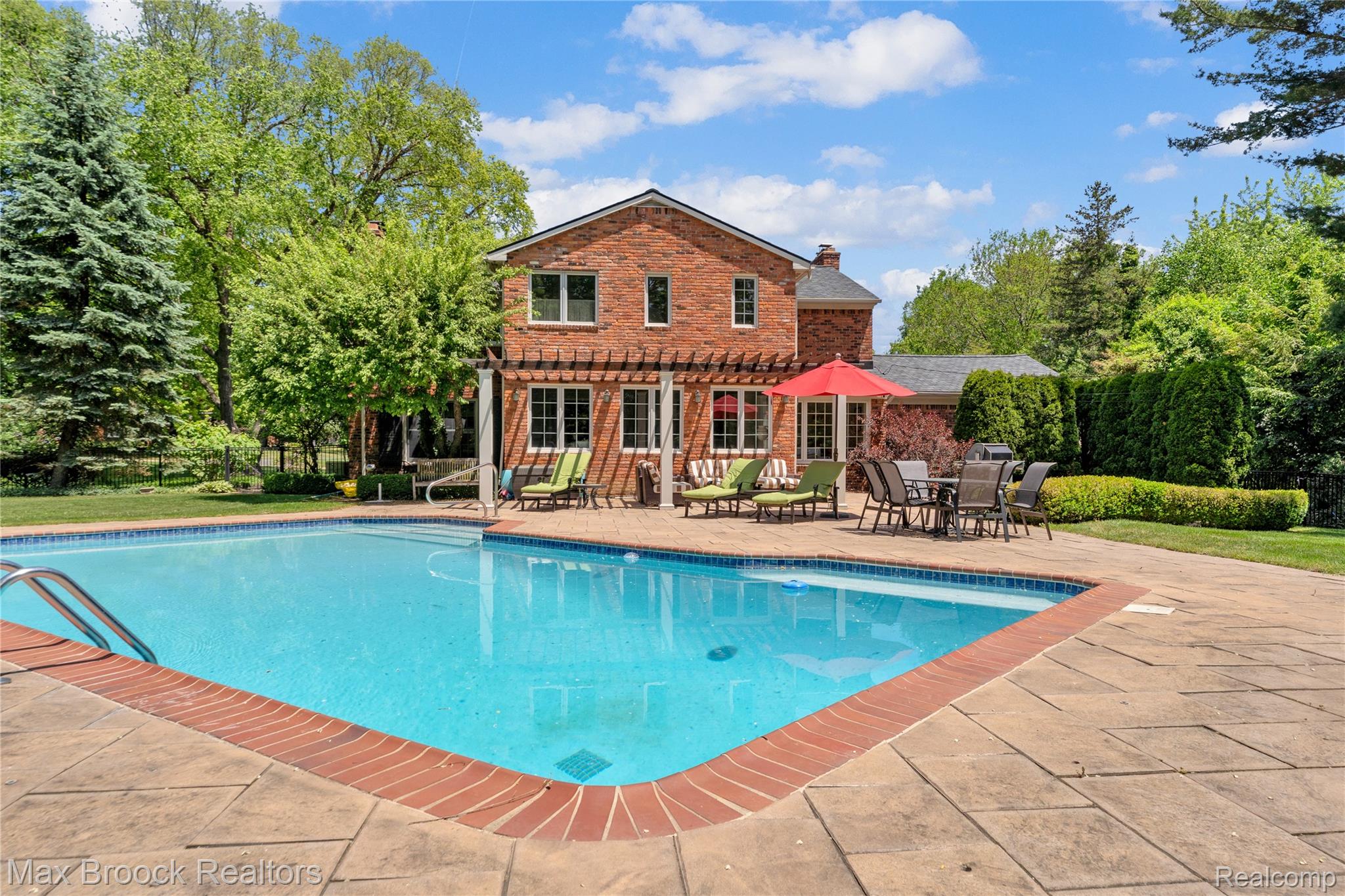 2620 Wendover Road Bloomfield Hills, MI 48302 - Photo 43 of 56 Back of home with saltwater pool and pool deck