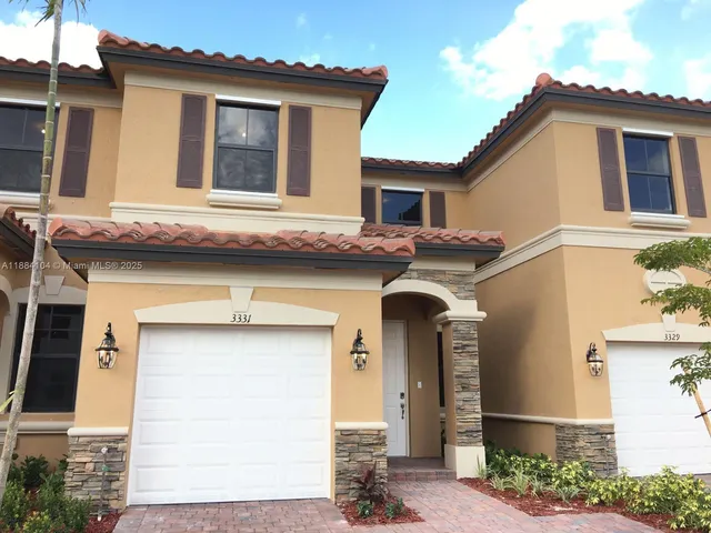 a house view with a outdoor space