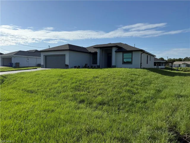 a house view with a garden space