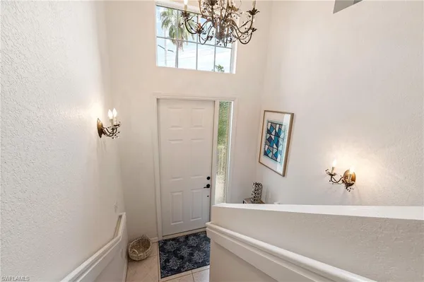 an aerial view of residential houses with outdoor space and street view
