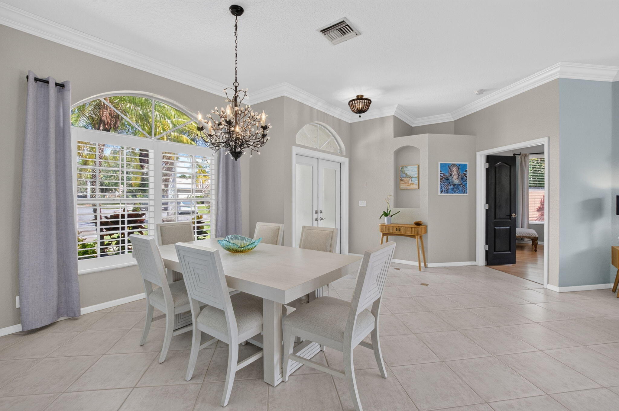 1365 East Barwick Ranch Circle Delray Beach, FL 33445 - Photo 14 of 77 a view of a dining room with furniture window and outside view