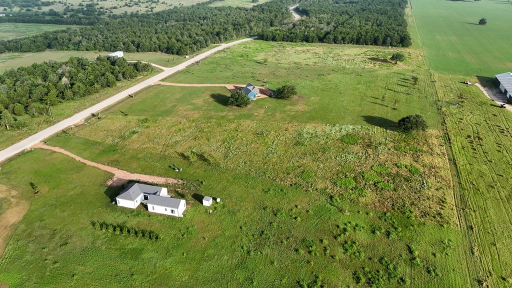 334 Vineyard View Trail Carmine, TX 78932 - Photo 9 of 12 a view of a garden from a balcony
