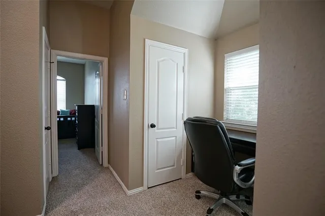 a bathroom with a double vanity sink toilet and a mirror