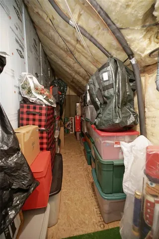 a view of a swimming pool with a patio and a garden