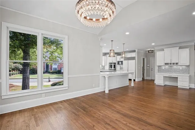 a spacious bathroom with a double vanity sink and a mirror