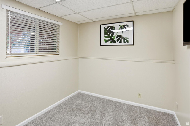 8938 Manchester Lane Sandy, UT 84093 - Photo 28 of 50 Room featuring light neutral wall paint, white trim, and gray carpet