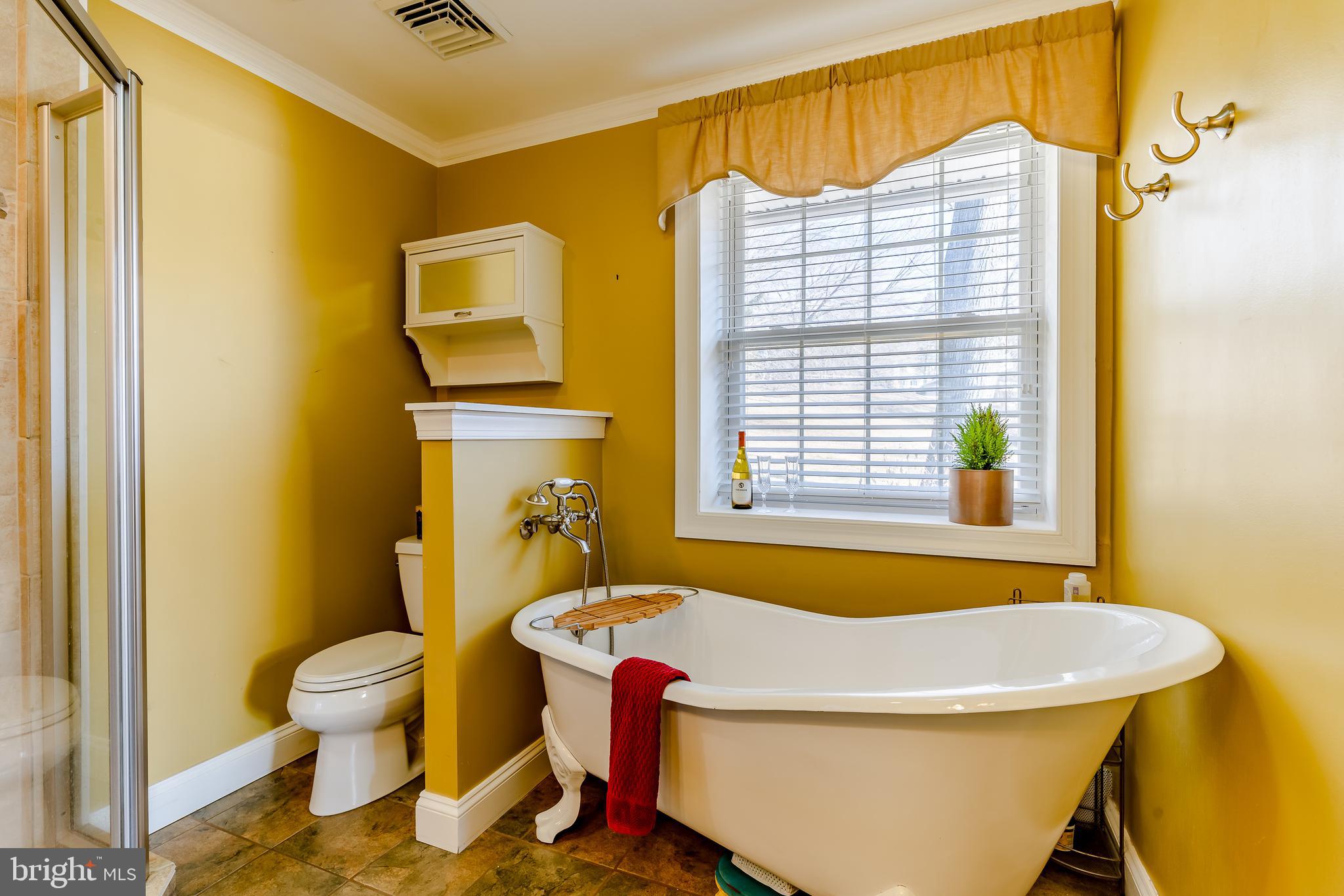 411 Linville Road Media, PA 19063 - Photo 16 of 33 Master bathroom with free stand soaking tub