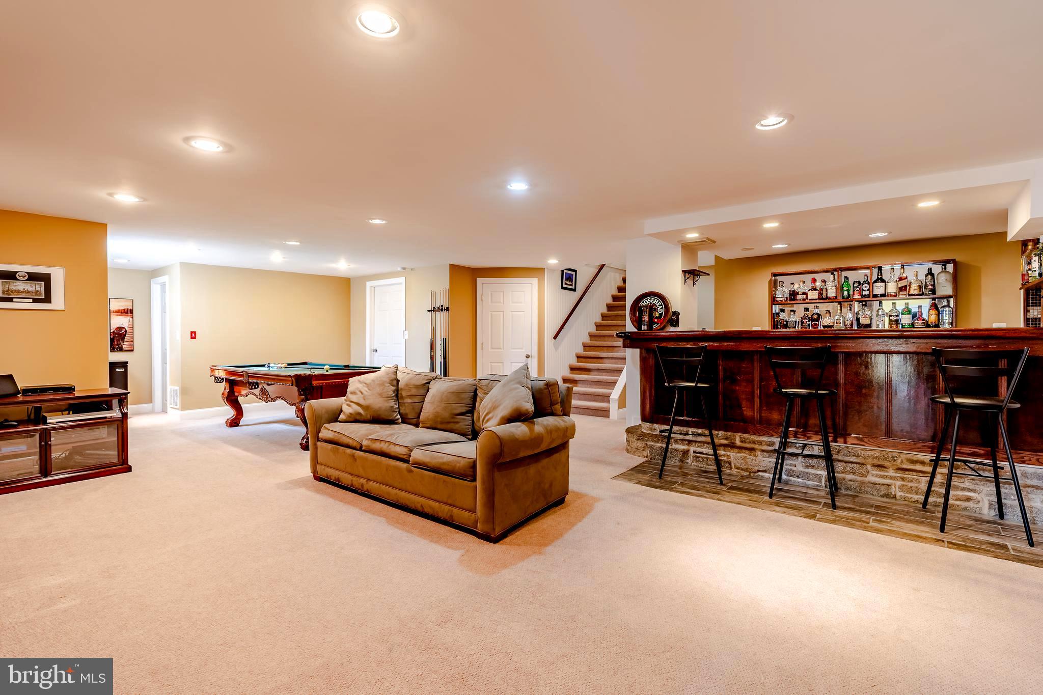 411 Linville Road Media, PA 19063 - Photo 22 of 33 Media room with new bar, carpet and game area