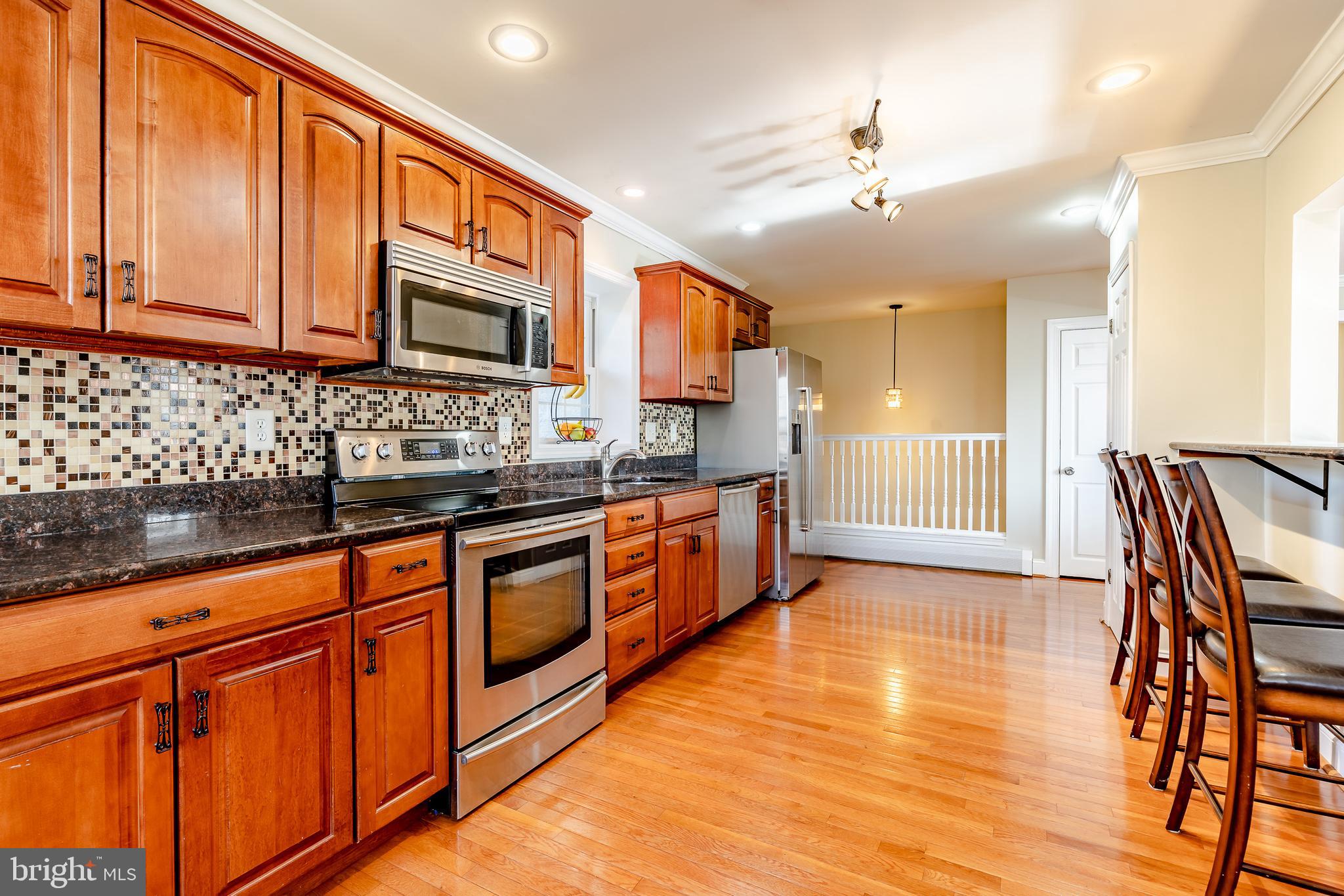 411 Linville Road Media, PA 19063 - Photo 8 of 33 View of kitchen showing the eating bar