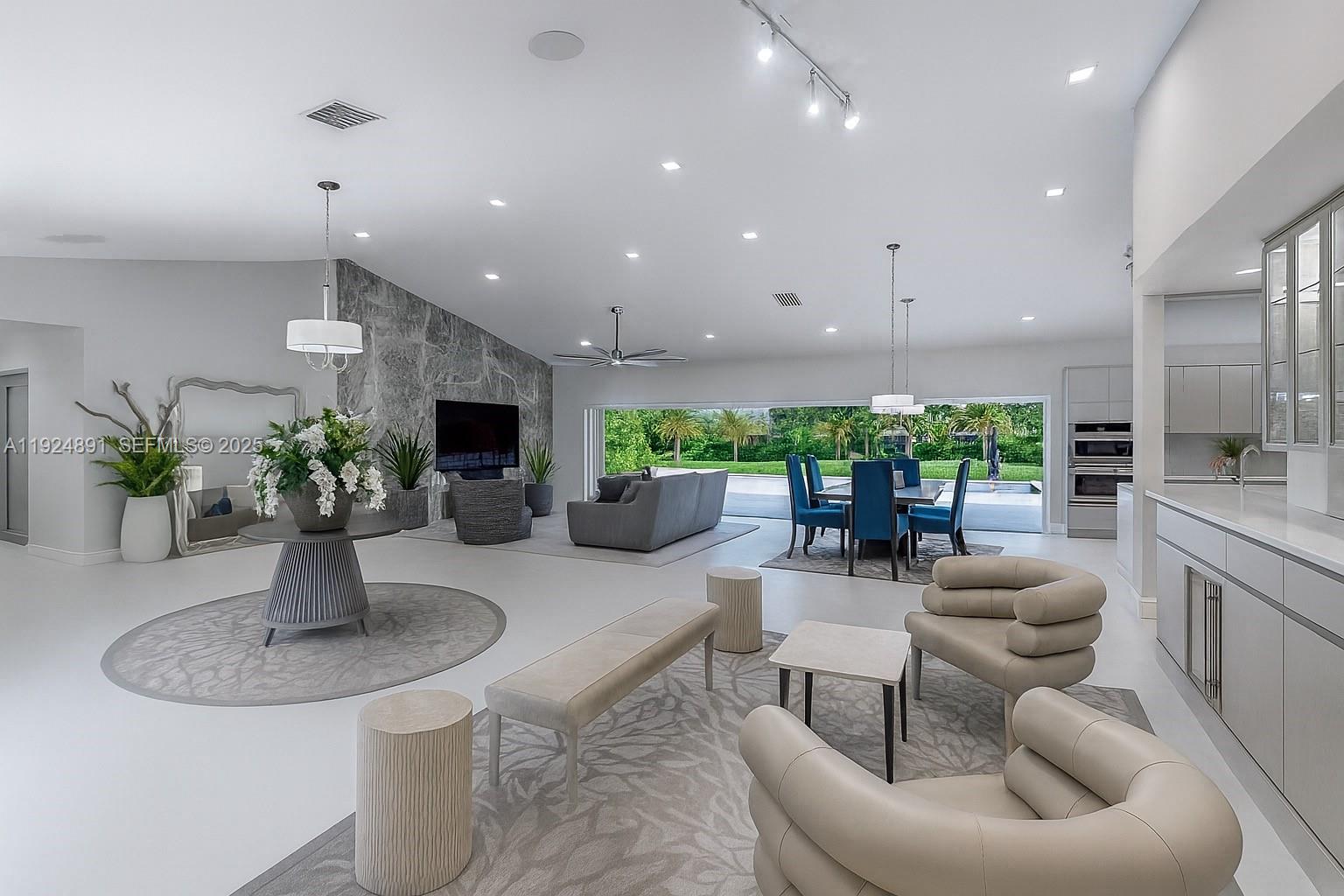 a lobby with furniture and a potted plant