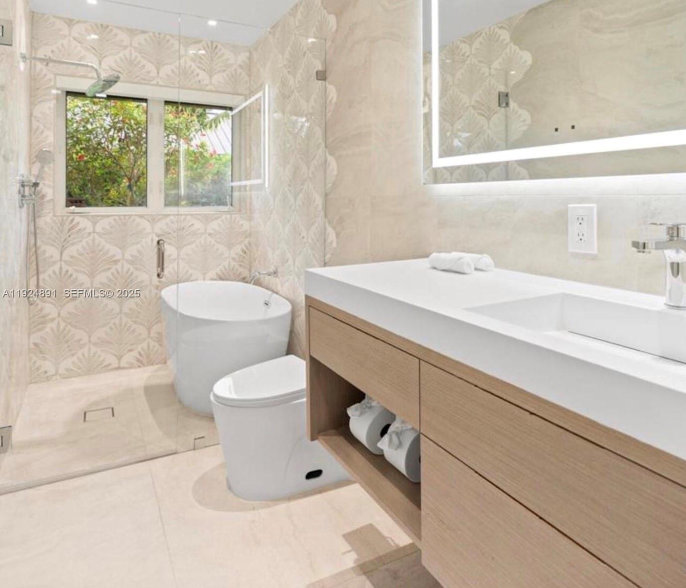 17873 Fieldbrook Circle East Boca Raton, FL 33496 - Photo 16 of 26 a bathroom with a sink toilet and window