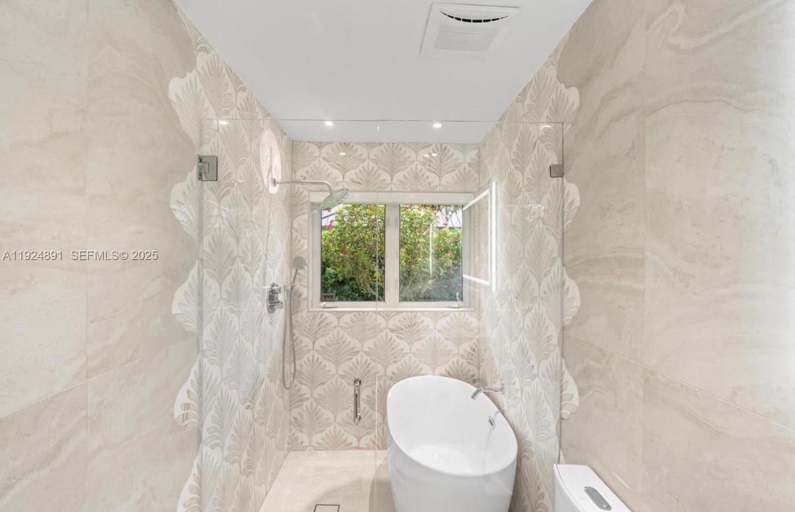 17873 Fieldbrook Circle East Boca Raton, FL 33496 - Photo 17 of 26 a bathroom with a sink toilet and shower