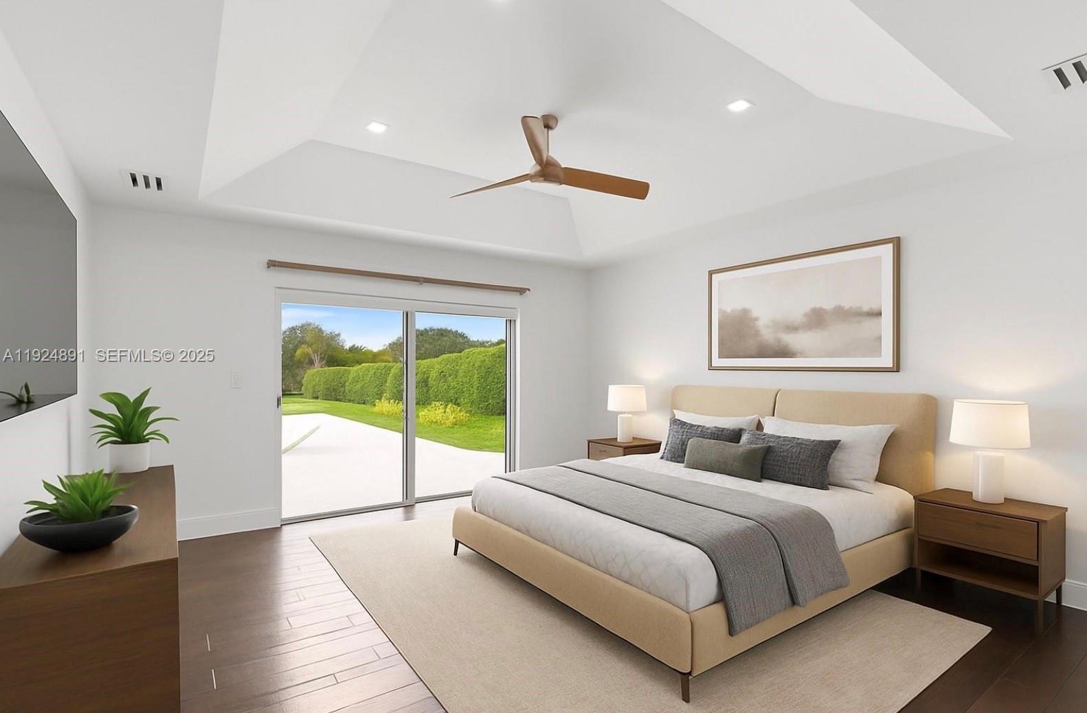 17873 Fieldbrook Circle East Boca Raton, FL 33496 - Photo 20 of 26 a bedroom with a balcony a large bed and a large window