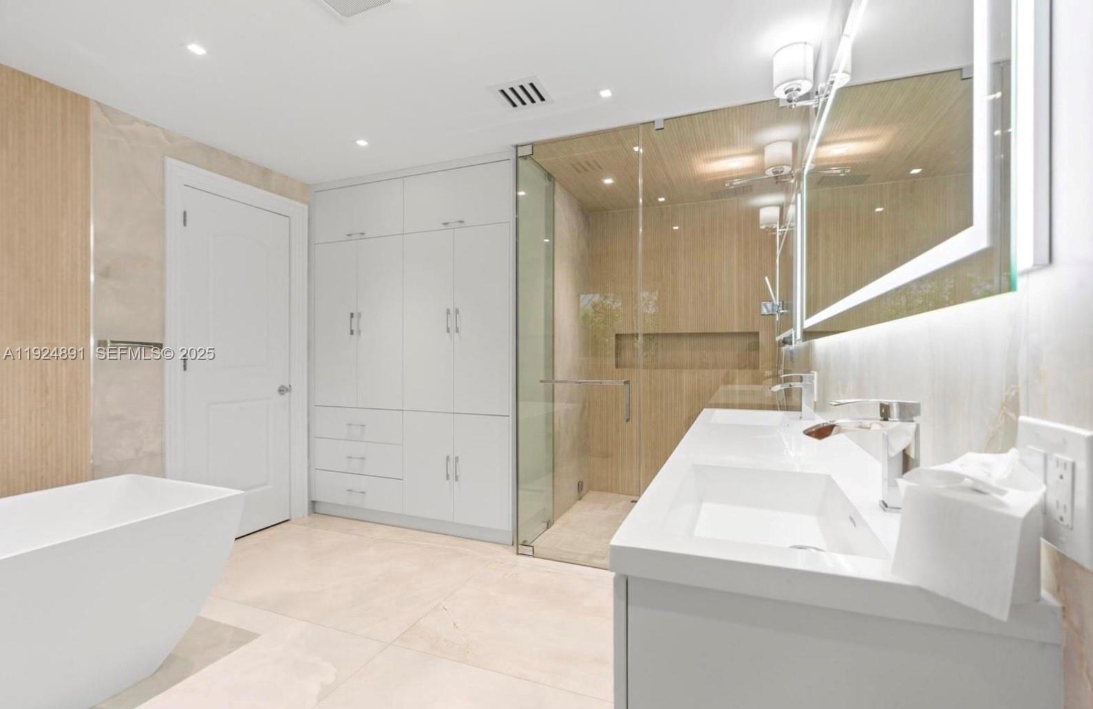 17873 Fieldbrook Circle East Boca Raton, FL 33496 - Photo 22 of 26 a bathroom with a sink a toilet and shower