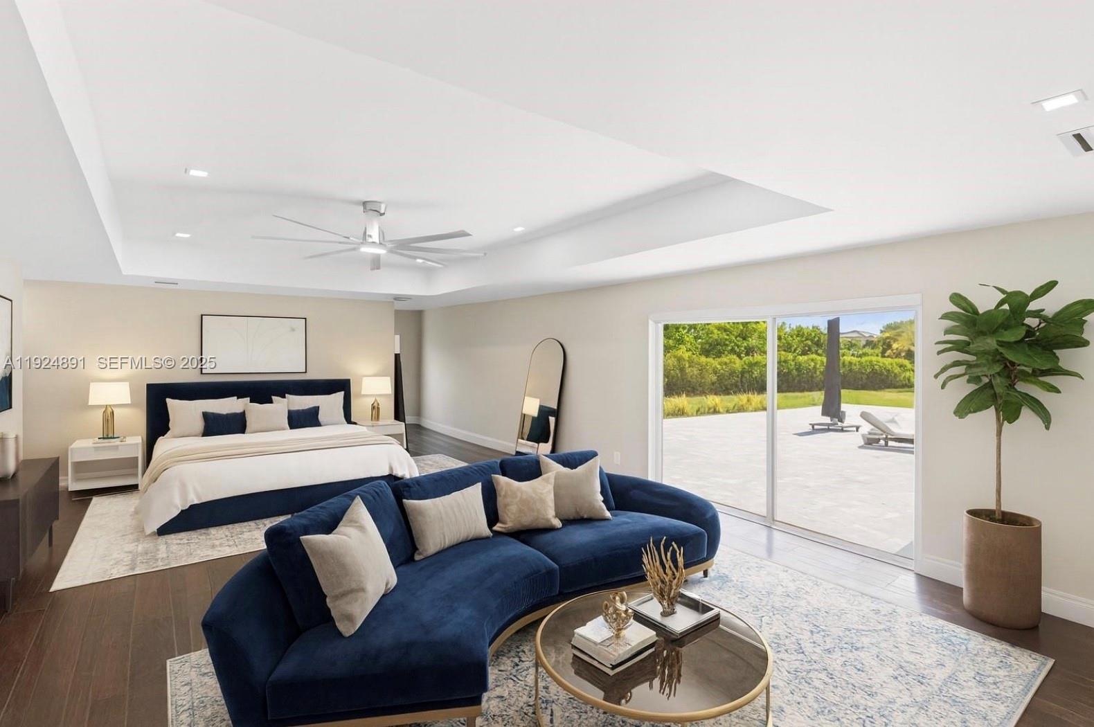 17873 Fieldbrook Circle East Boca Raton, FL 33496 - Photo 24 of 26 a living room with furniture and a large window