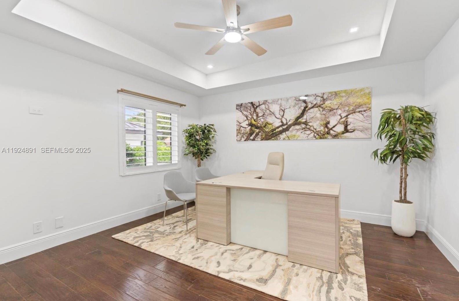 17873 Fieldbrook Circle East Boca Raton, FL 33496 - Photo 25 of 26 a living room with furniture and a potted plant