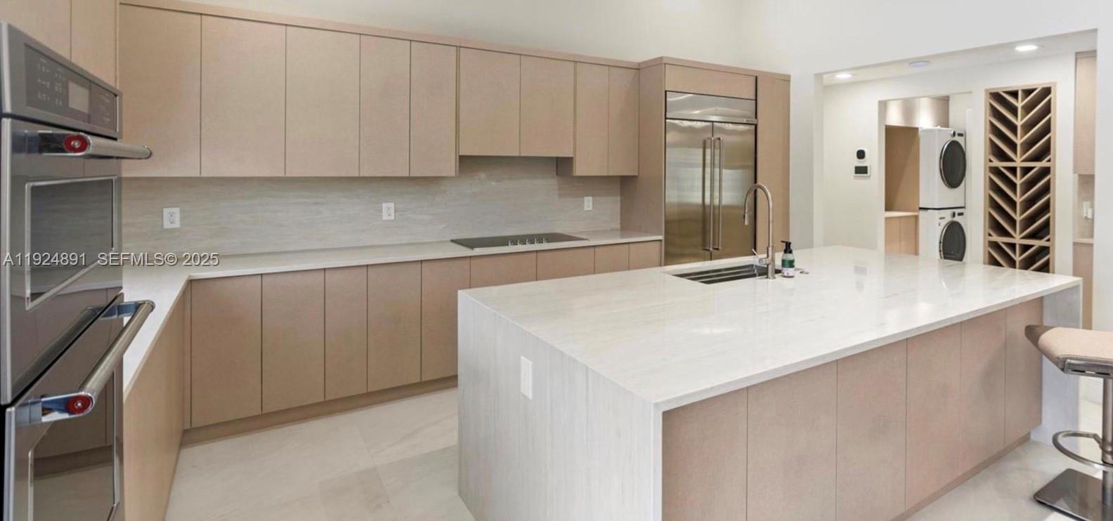 17873 Fieldbrook Circle East Boca Raton, FL 33496 - Photo 7 of 26 a kitchen with a sink a stove and cabinets