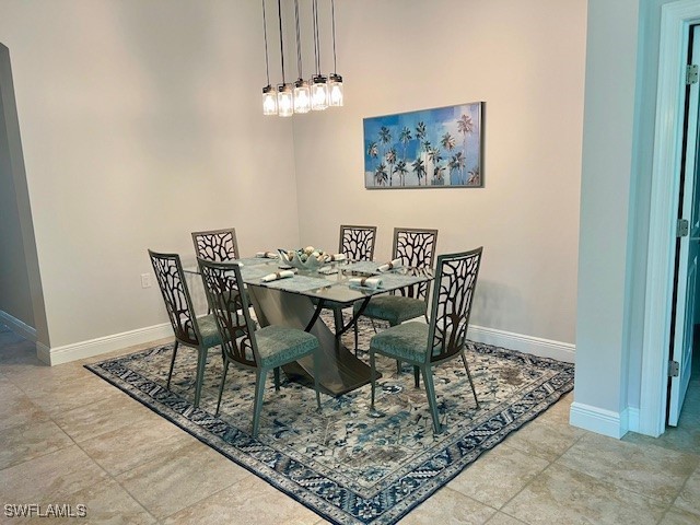 10455 Casella Way, Unit 202 Fort Myers, FL 33913 - Photo 16 of 41 a view of a dining room with furniture