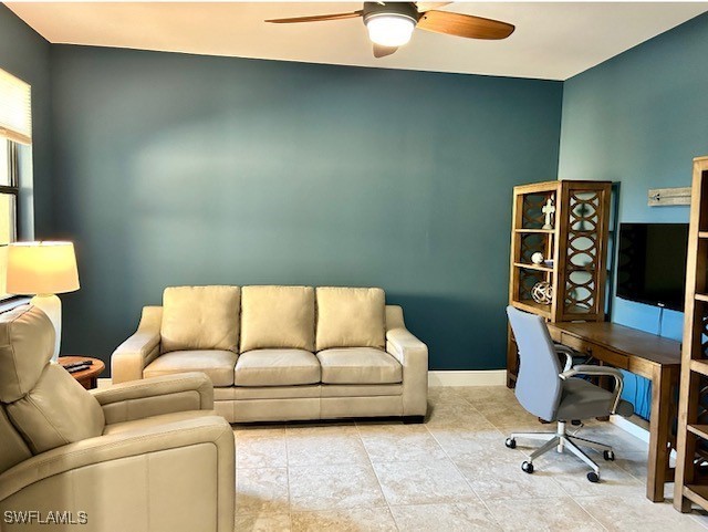 10455 Casella Way, Unit 202 Fort Myers, FL 33913 - Photo 17 of 41 a living room with a couch and a chair