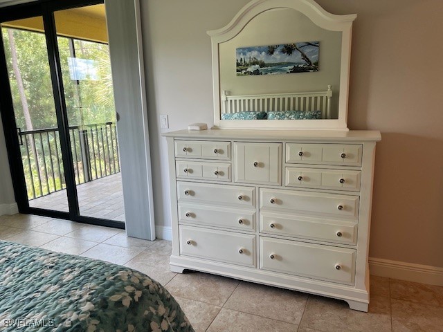 10455 Casella Way, Unit 202 Fort Myers, FL 33913 - Photo 21 of 41 a bedroom with a bed and a window