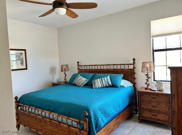 10455 Casella Way, Unit 202 Fort Myers, FL 33913 - Photo 25 of 41 a bedroom with a bed and window
