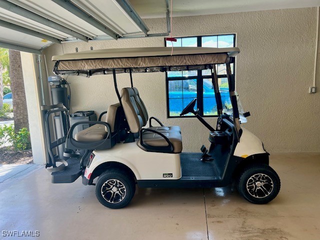 10455 Casella Way, Unit 202 Fort Myers, FL 33913 - Photo 32 of 41 a view of car garage