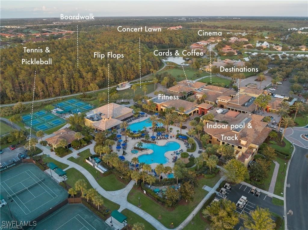 10455 Casella Way, Unit 202 Fort Myers, FL 33913 - Photo 36 of 41 an aerial view of residential houses with outdoor space
