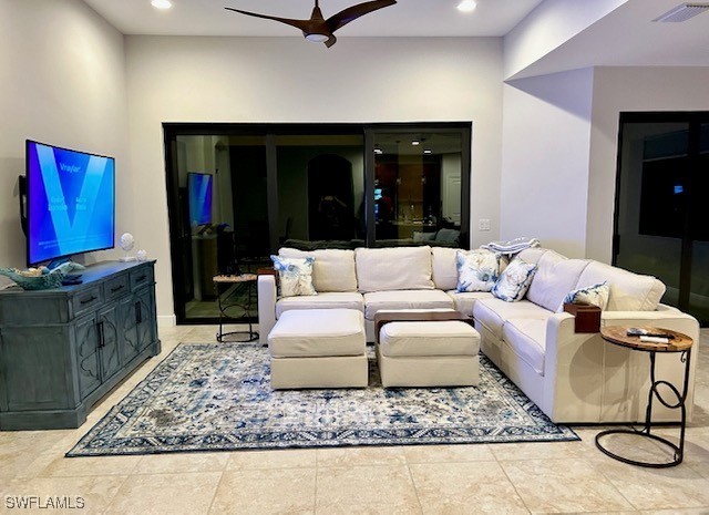 10455 Casella Way, Unit 202 Fort Myers, FL 33913 - Photo 9 of 41 a living room with furniture and a flat screen tv