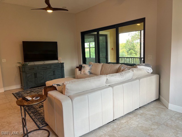 10455 Casella Way, Unit 202 Fort Myers, FL 33913 - Photo 10 of 41 a bedroom with a bed and a flat screen tv