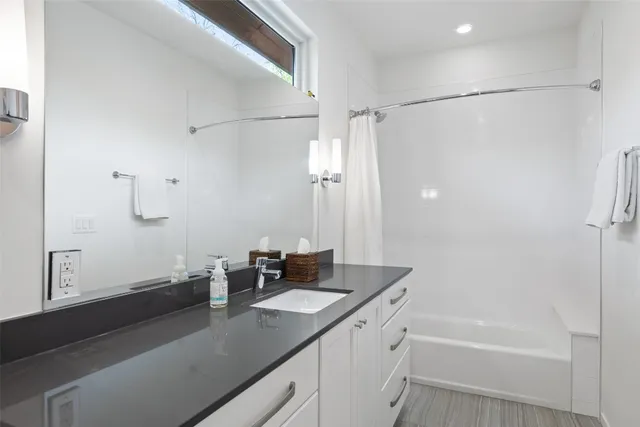 an aerial view of a house with yard swimming pool and outdoor seating