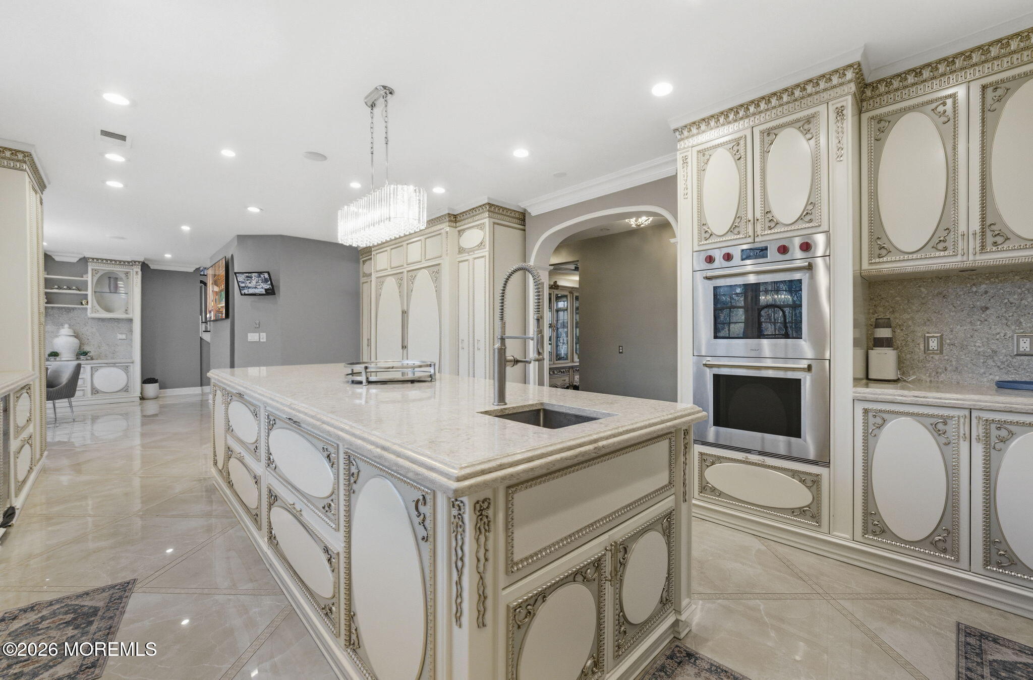 4 Squan Song Lane Colts Neck, NJ 07722 - Photo 13 of 45 a kitchen with stainless steel appliances granite countertop a stove and a refrigerator
