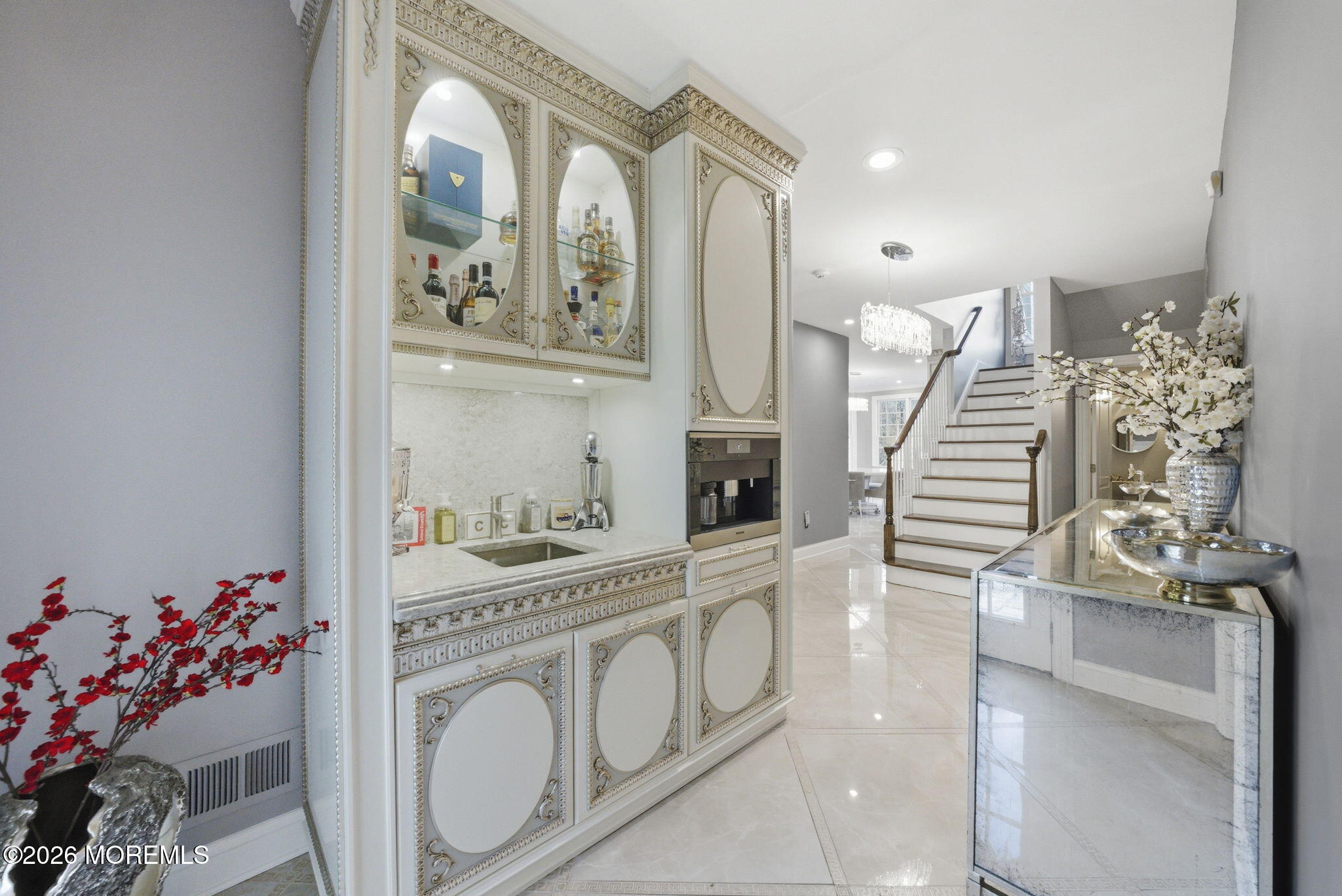 4 Squan Song Lane Colts Neck, NJ 07722 - Photo 15 of 45 a view of a hallway to a livingroom with furniture