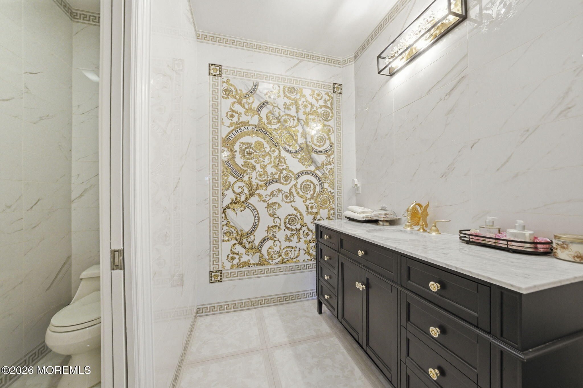 4 Squan Song Lane Colts Neck, NJ 07722 - Photo 18 of 45 a bathroom with a double vanity sink toilet and a shower