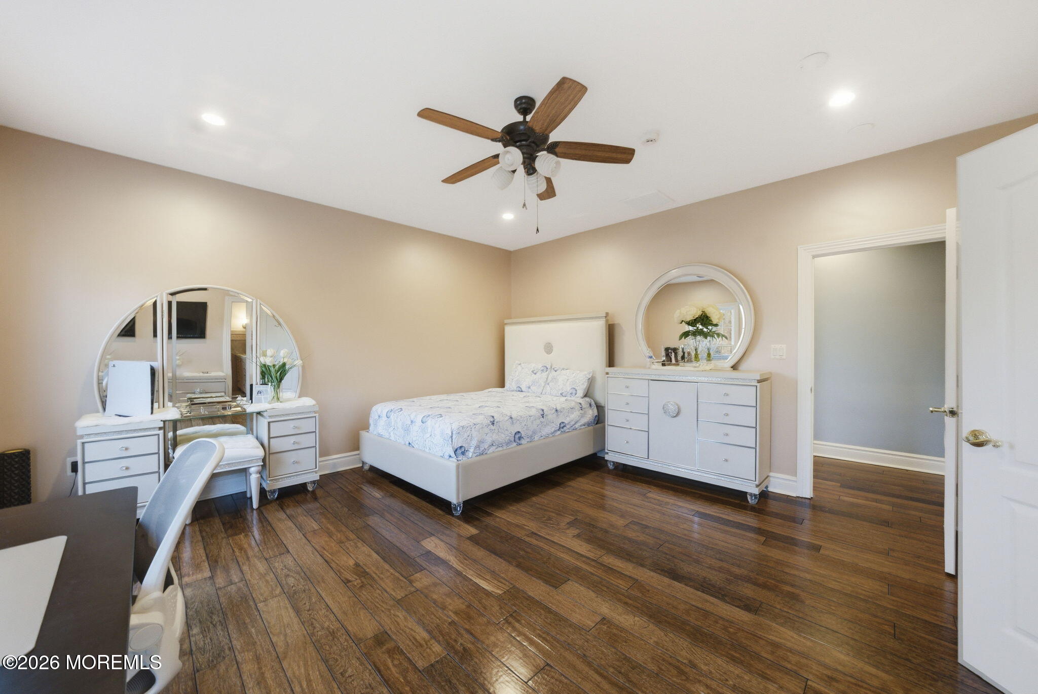4 Squan Song Lane Colts Neck, NJ 07722 - Photo 23 of 45 a bedroom with a bed and a desk