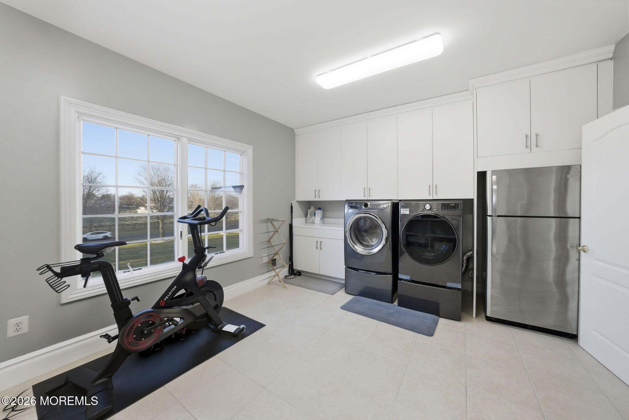 4 Squan Song Lane Colts Neck, NJ 07722 - Photo 25 of 45 a view of a kitchen with washing machine and windows